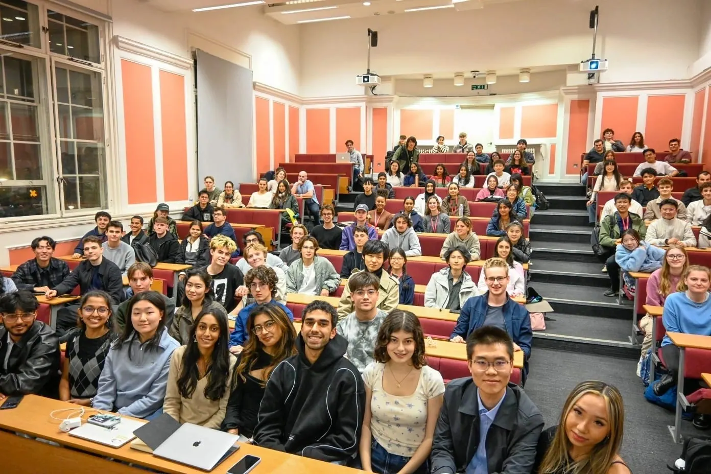 A packed lecture theatre of students at a society event
