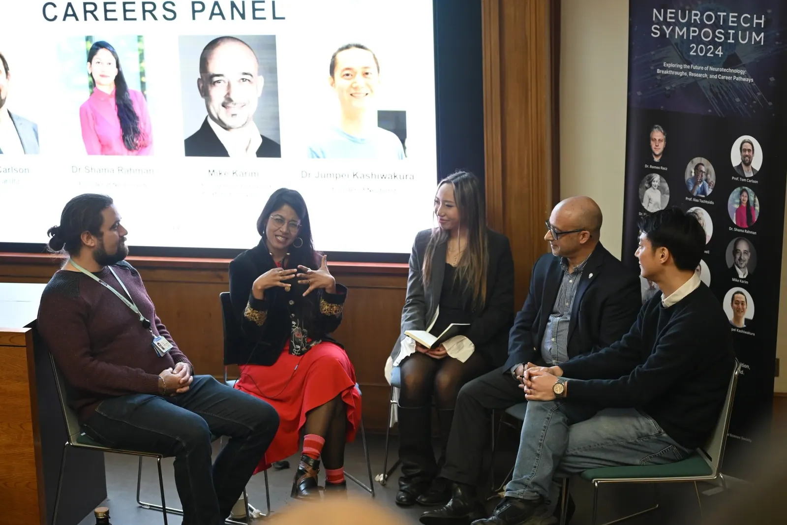 Careers panel speakers seated on stage at the 2024 symposium